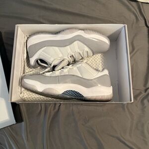Grey & White Jordan 11 ‘University Blue’